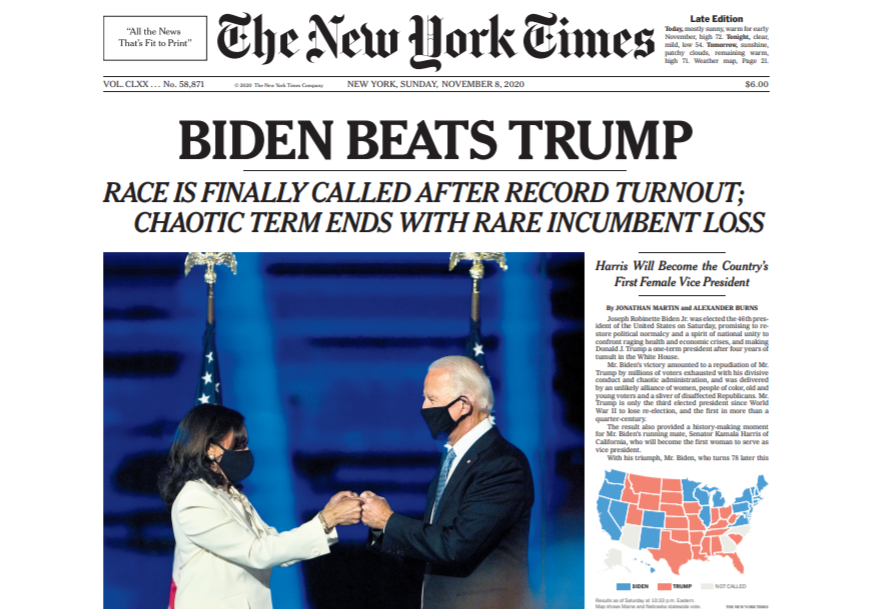A New York Times newspaper with the headline 