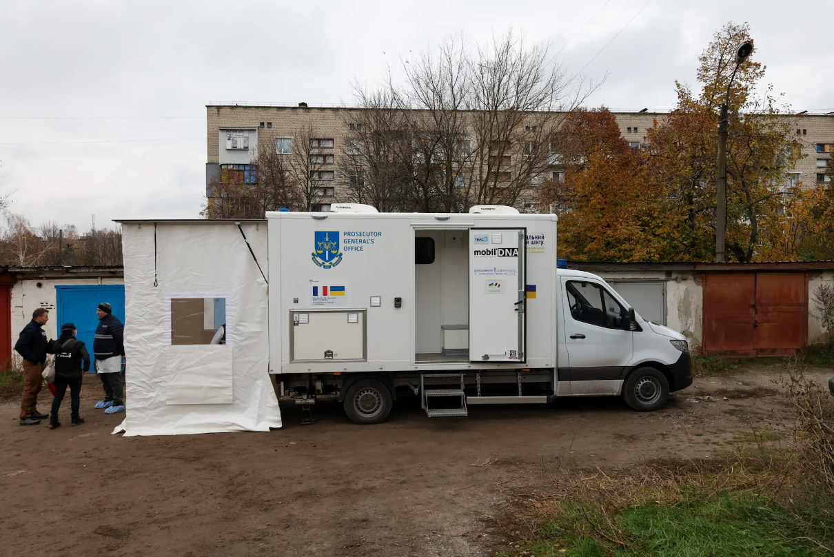 The mobile DNA lab provided by French authorities is seen Nov. 4 in Izium, where Ukrainian scientists have been trained to take DNA from bodies to identify them and to gather evidence for potential war-crimes trials.