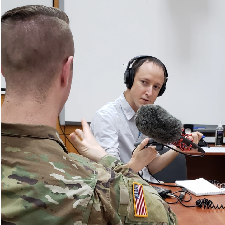 Photo By Cpl. Jared Saathoff | Journalist Levi Bridges conducts an audio interview with 1st Lt. Troy Smith, the assistant operations officer of Task Force Juvigny at Joint Multinational Training Group – Ukraine, at Combat Training Center – Yavoriv. (U.S. Army photo by Cpl. Jared Saathoff)