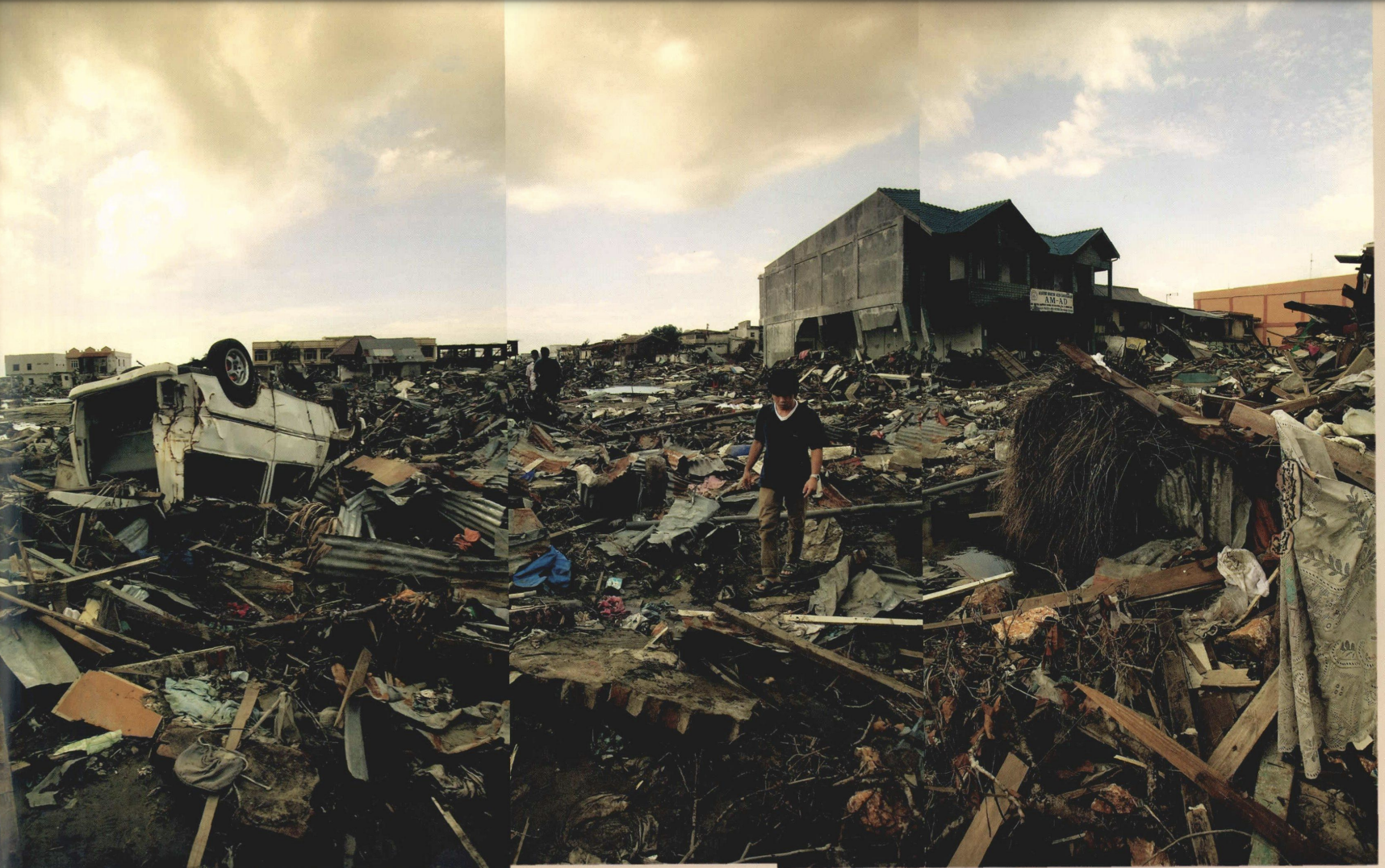 Several images stitched together show wreckage of what used to be a home.