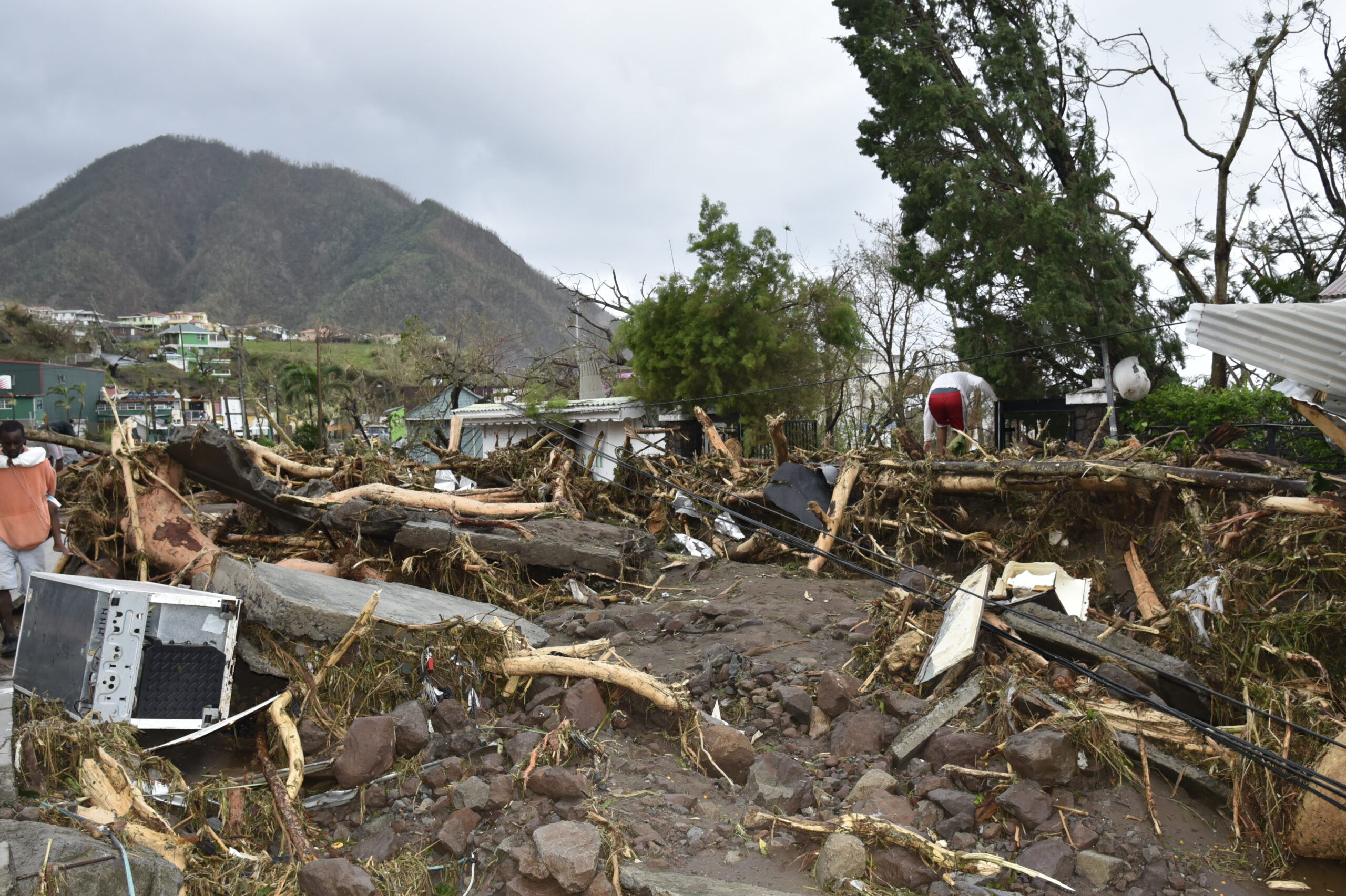 Destruction following a hurricane shows debris of a home.
