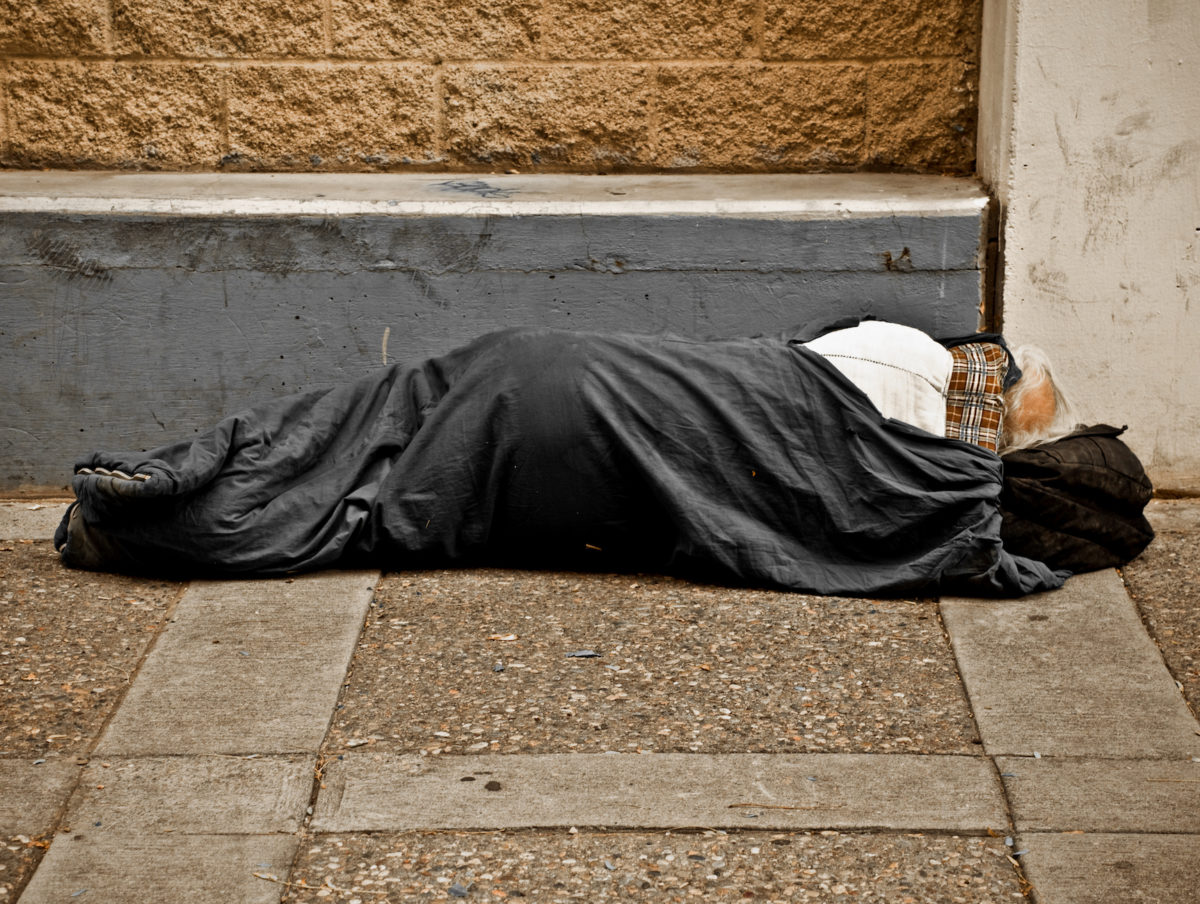 A man sleeping on the street